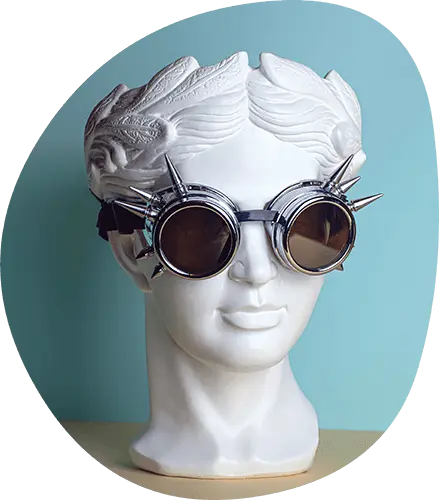 Bust (sculpture) wearing steampunk glasses with spikes