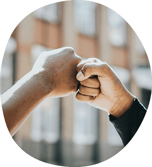 Partners giving a fist bump